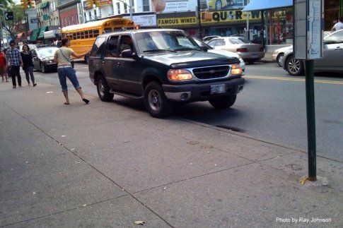 suv driving on sidewalk 1