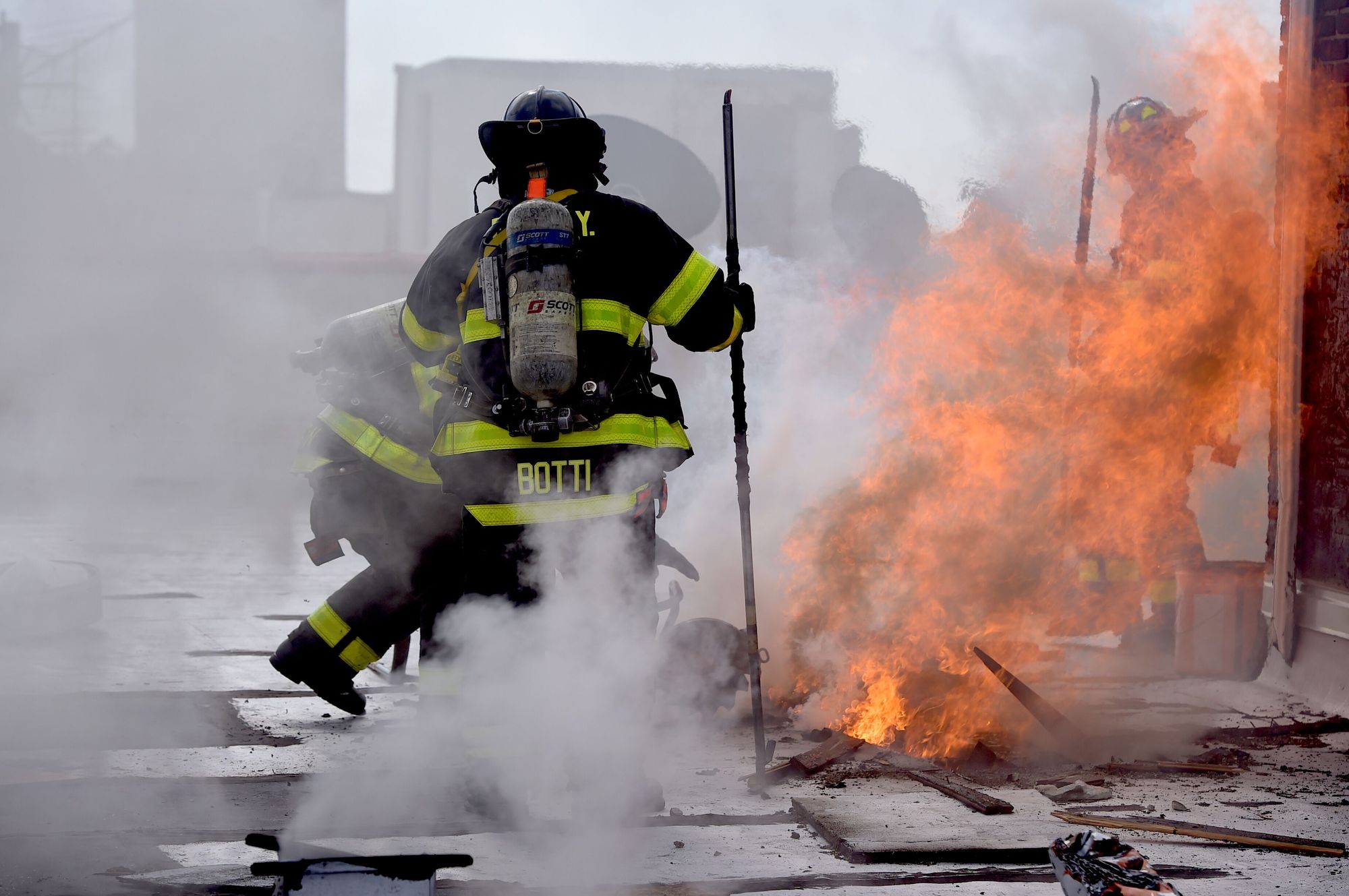 Firefighters rushed to extinguish a fire on the roof of a six-story apartment building at 180 East 18th Street in Ditmas Park Monday morning. By Maisel/Bklyner