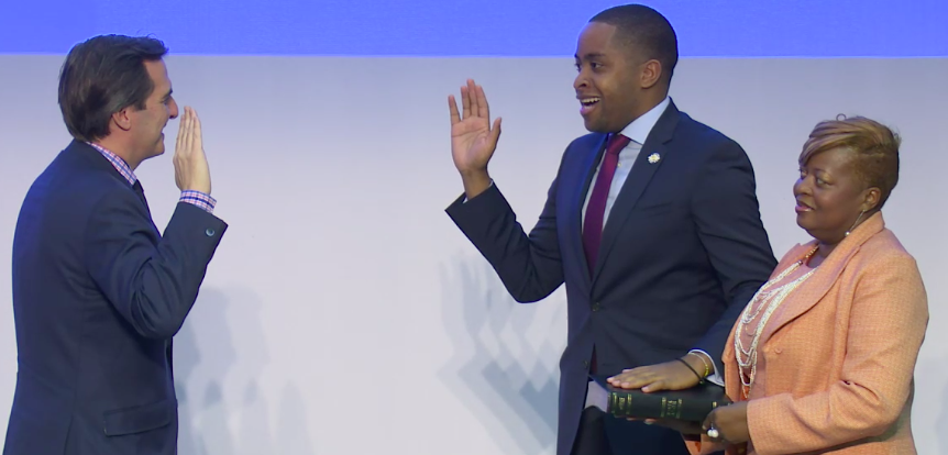 State Sen.Zellnor Myrie at his in-district inauguration with his mother Marcelina Cummings and State Sen. Michael Gianaris (Screenshot: Myrie's live Twitter stream)