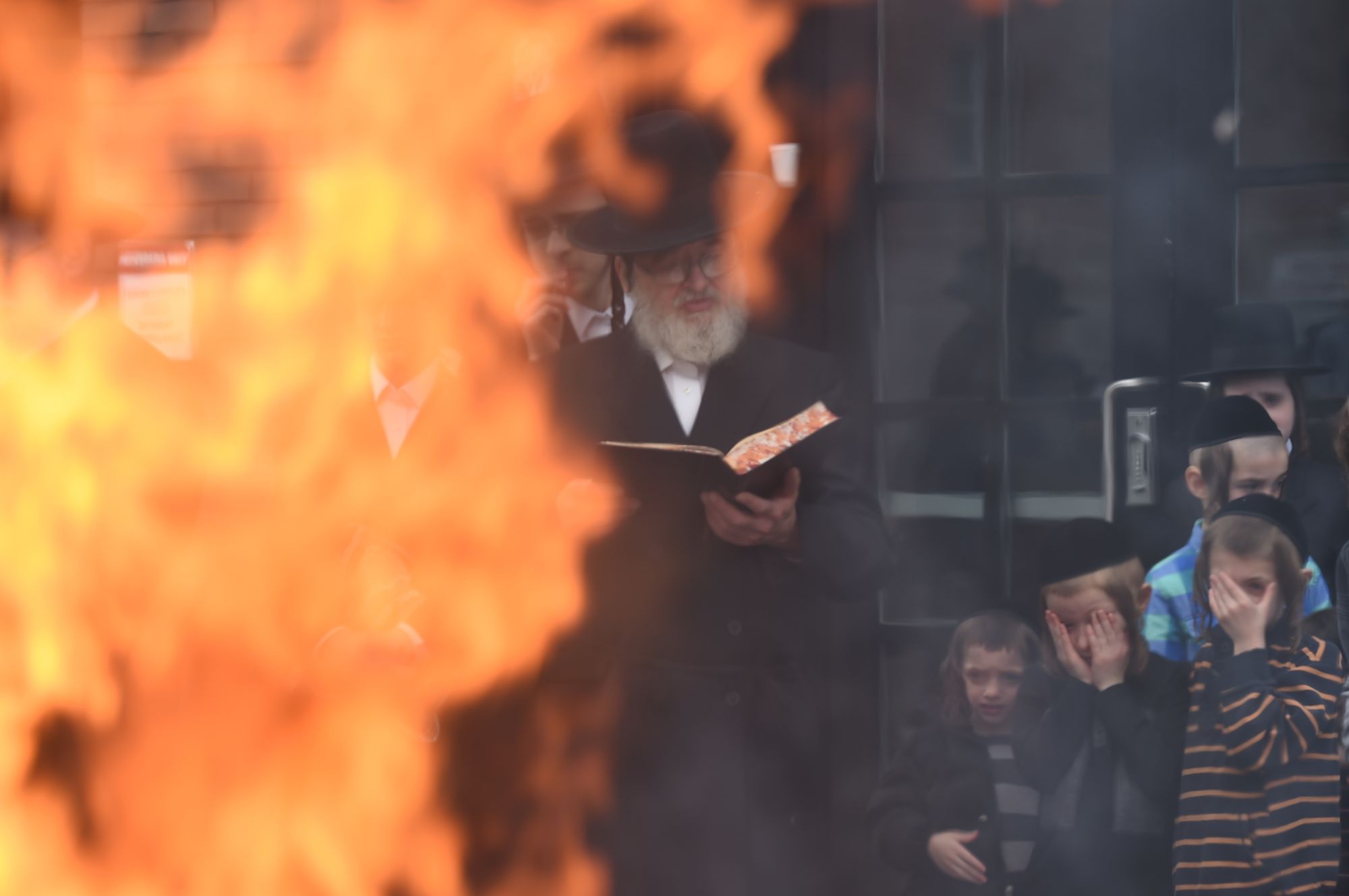 Passover and Good Friday Celebrated With Burning of Chametz And Carrying of Crosses