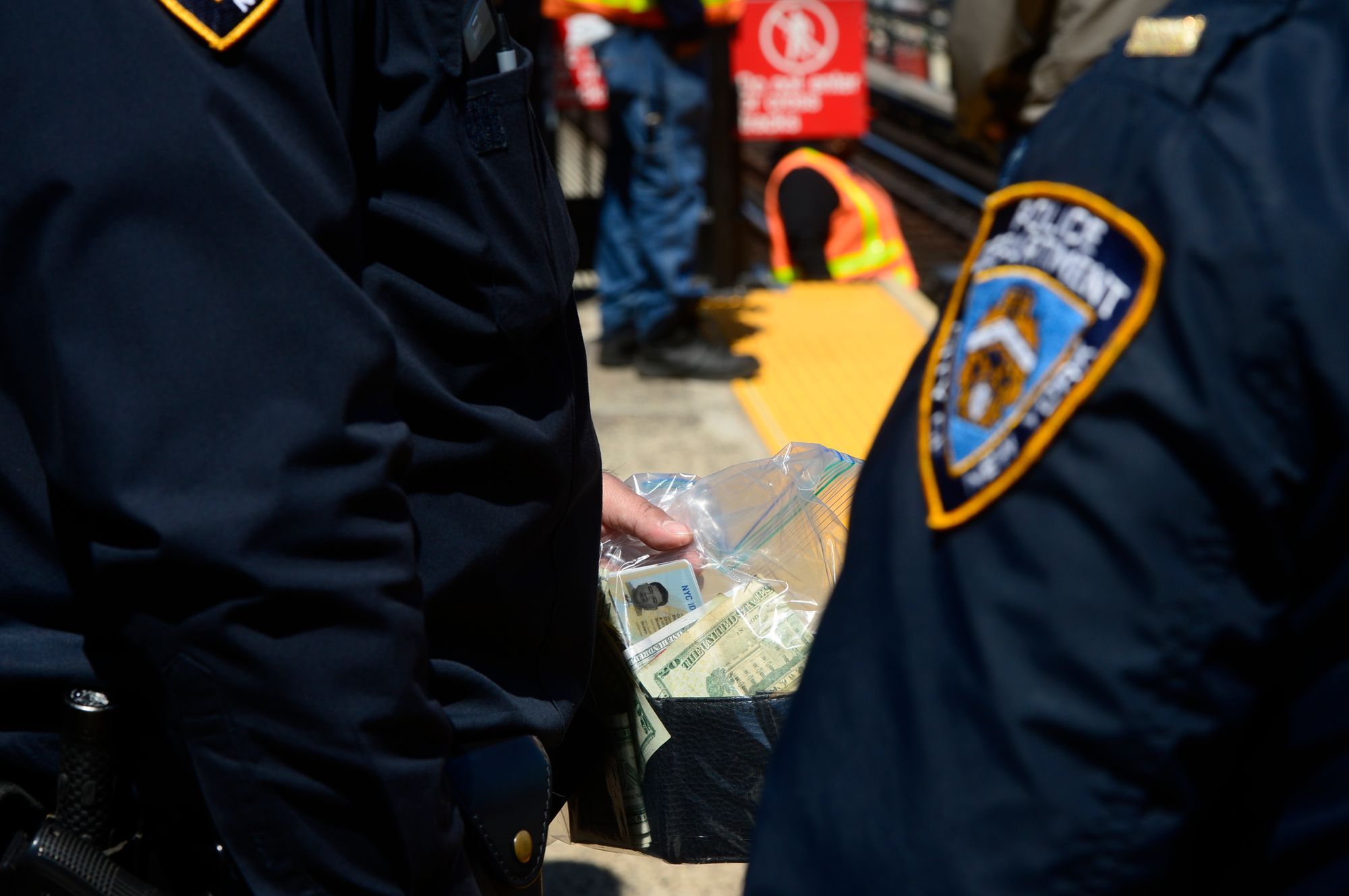 Contractors working on electrical work on Kings Highway and McDonald Avenue on the elevated F train line, found body parts and personal belongings of a man struck and killed by a train Monday night. Service was interrupted. (Photo: Todd Maisel/Bklyner)