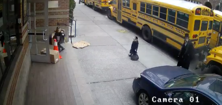 Car Drives On Sidewalk To Avoid Waiting For School Buses