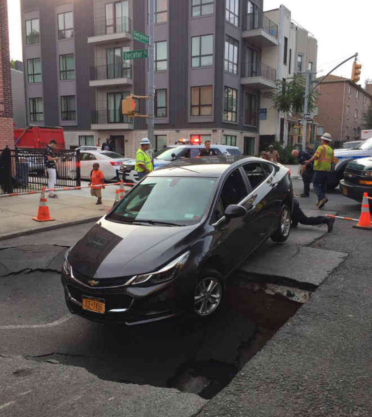 Massive Sinkhole Almost Swallows Car In Bushwick