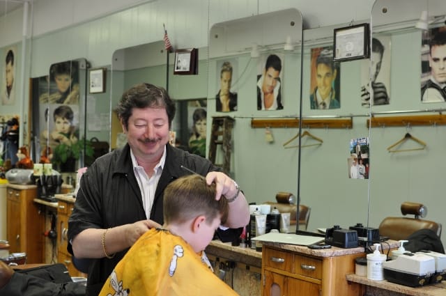 Leon Celebrates 100 Years of Haircuts on Newkirk Plaza