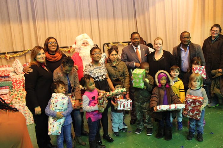 Councilman Mathieu Eugene Hosts Holiday Party For Hundreds Of Children At PS 139