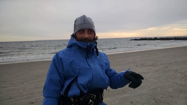 Windsurfers Glide Over A Snowy Brighton Beach [Video]