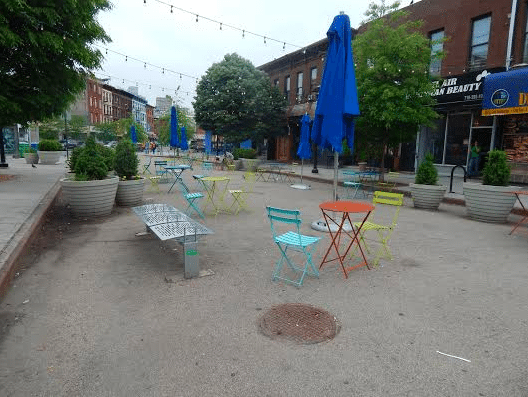 Gentrification And Its Discontents: The Conversation Around Putnam Triangle Plaza