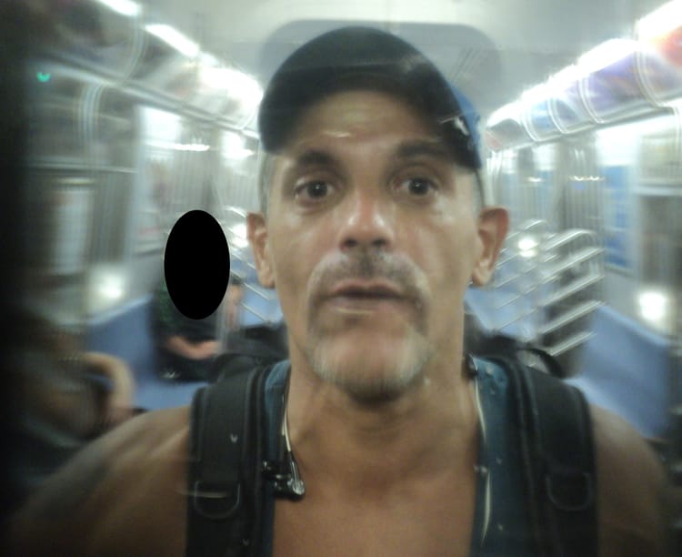 Police Looking For Man Who Threatened Subway Riders With Glass Bottle