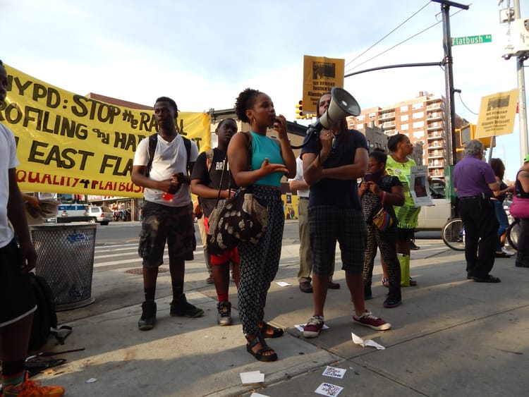 Neighbors Rally Outside Flatbush Junction Target; Call For Dropping Charges Against Alando Brissett, Who Was Punched & Pinned To Ground During Arrest