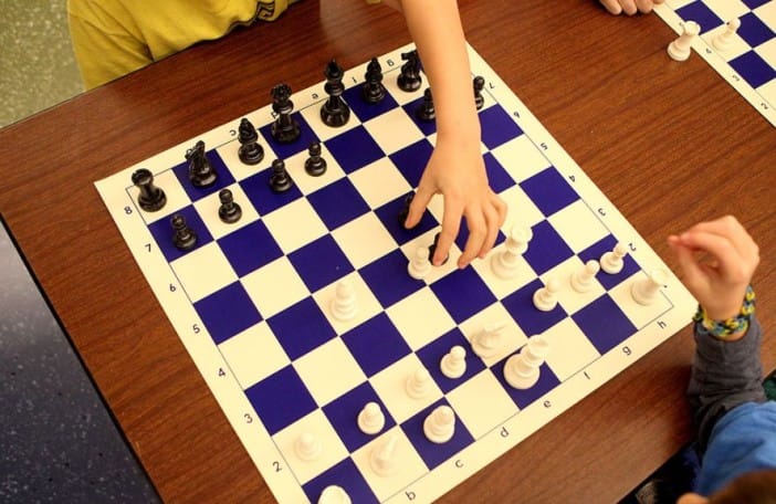 Things For Kids To Do In Southern Brooklyn: Chess Time, Football Toss, Despicable Me 2