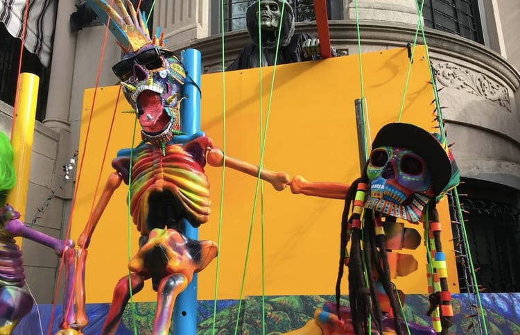 Colorful Skeletons On 9th Street Smile For Día De Los Muertos And Frown On Trump