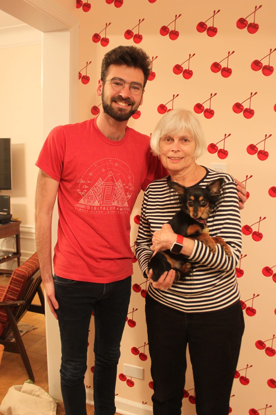 Meet the Grandmother and Grandson Behind Umbrella