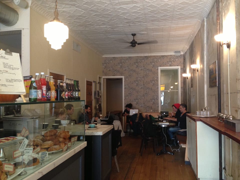 Cafe Madeline Expands Seating With Bench-Lined Back Room