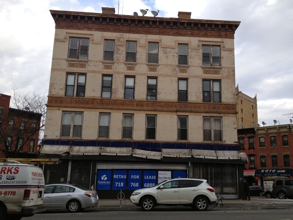 Yummy Taco Signage Down, Storefront Available To Rent