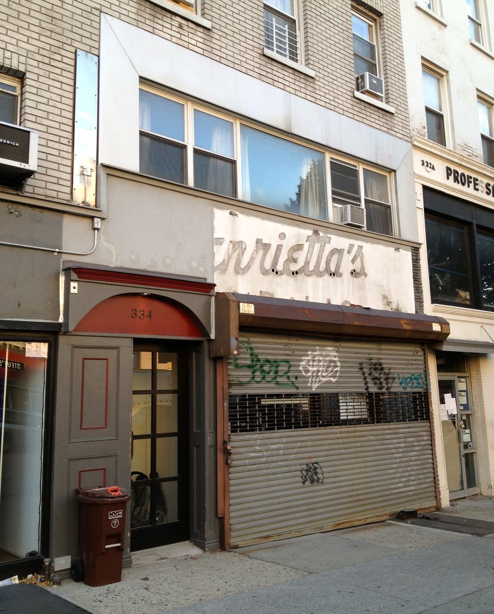 “Henrietta’s” Ghost Sign Revealed On 9th Street