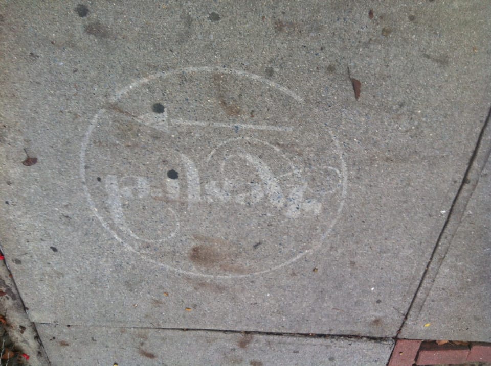 Kestrel Removes Illegal Sidewalk Stencils, Though Some Remain