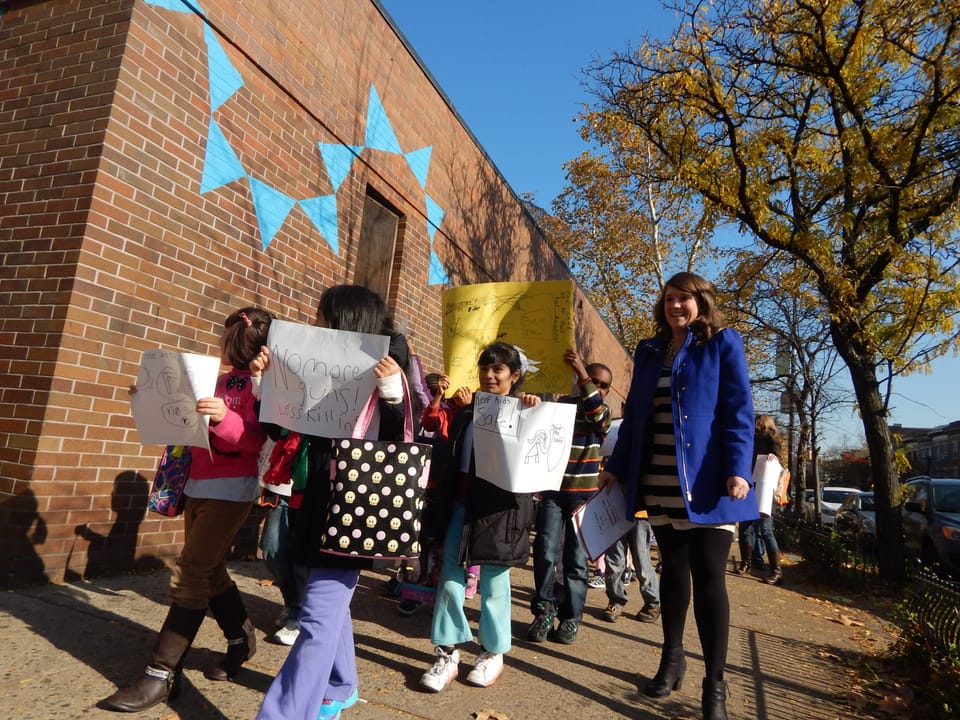 Amidst A Sea Of Poster Board, A Message From PS 139 Students: No Guns