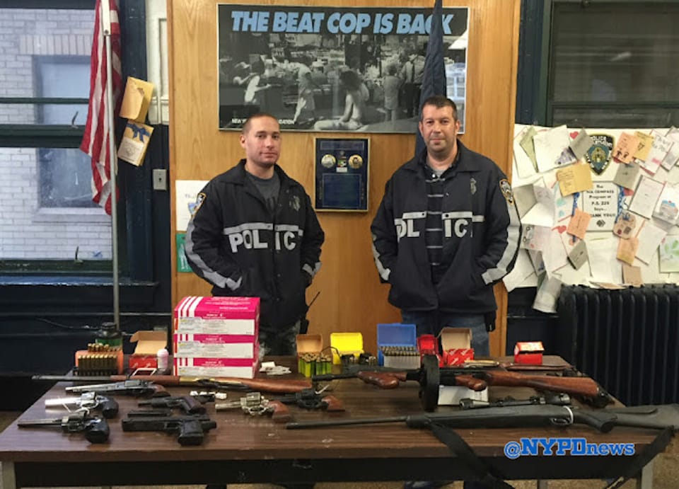 Cops Arrest Two With Huge Arsenal Of Weapons Including Hunting Knives, Rifles & Machine Gun