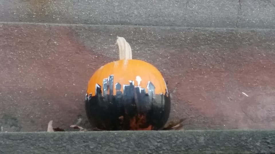 Photo Finish: Big Apple On A Small Pumpkin