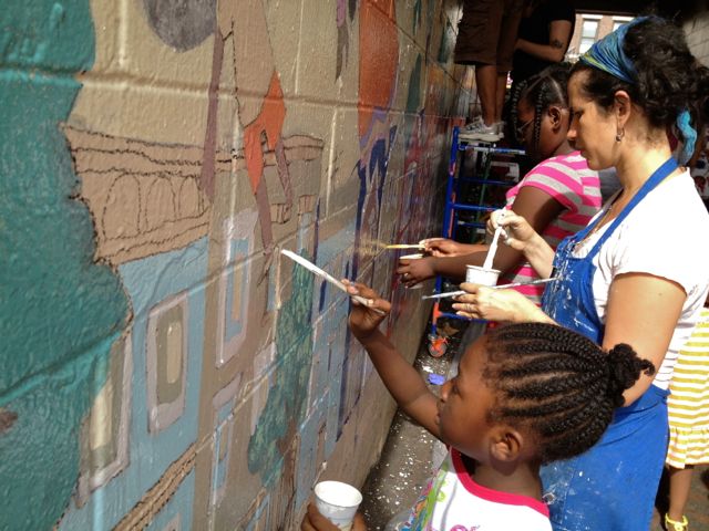 Lots of Helping Hands at Newkirk Plaza Mural Painting