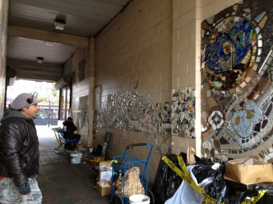 Carlos Pinto and Volunteers Work on Newkirk Plaza Mosaic