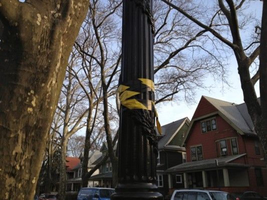 Caution Tape on Lamppost