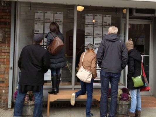 House Hunters Looking at Brooklyn Hearth Window