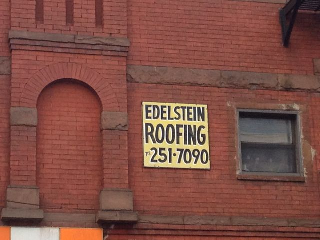 Edelstein Roofing Sign on 7th & 7th