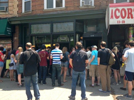 Fans listening to The National from the sidewalk outside of Sycamore