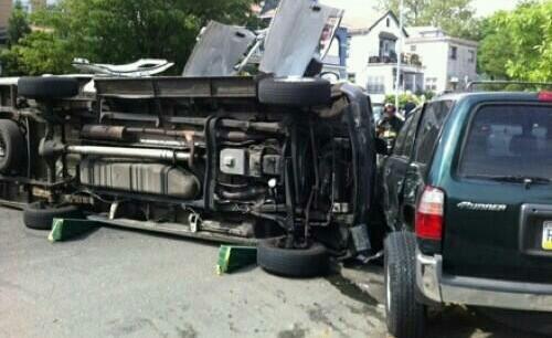 Overturned ambulette on Albemarle, via NYCityAlerts on Tiwtter