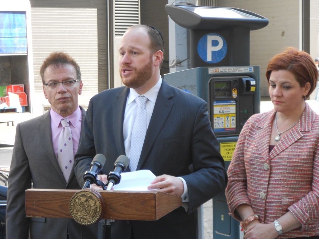 Councilman David Greenfield (center) and Mayoral Candidate Christine Quinn standing in front of a Muni-Meter 