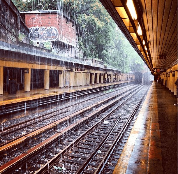 rainy church subway platform by andrewlowden