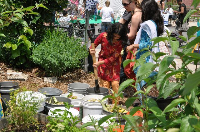 Stirring Compost at C4B Block Party