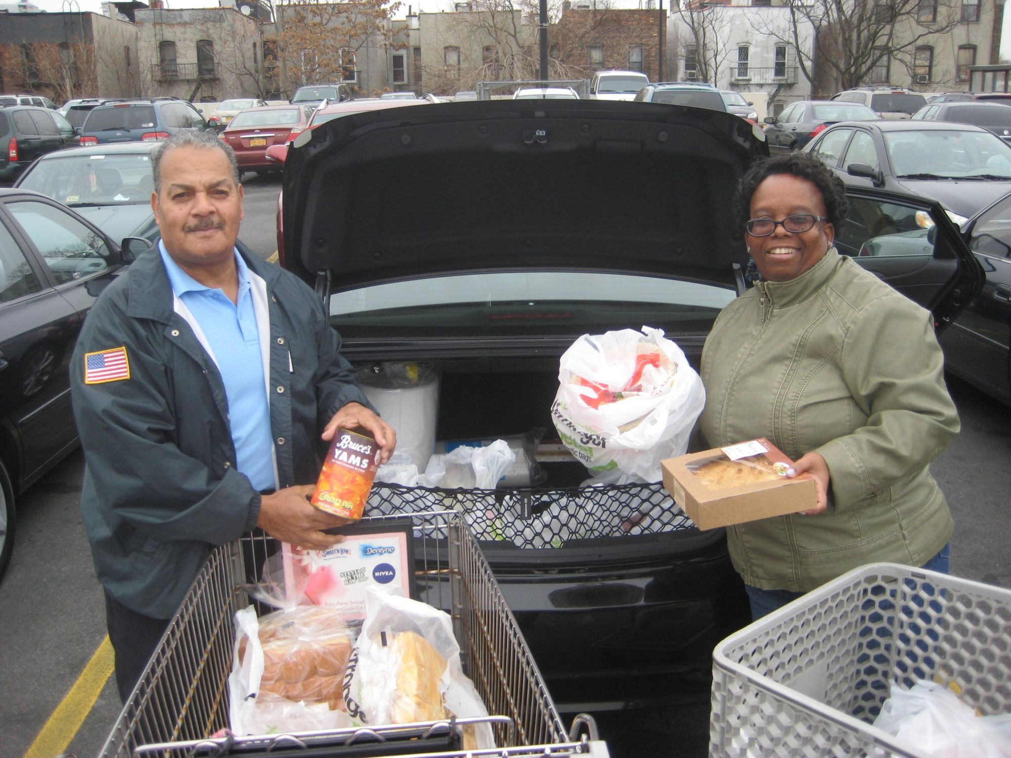 Flatbush BID Thanksgiving Shopping Louie & woman