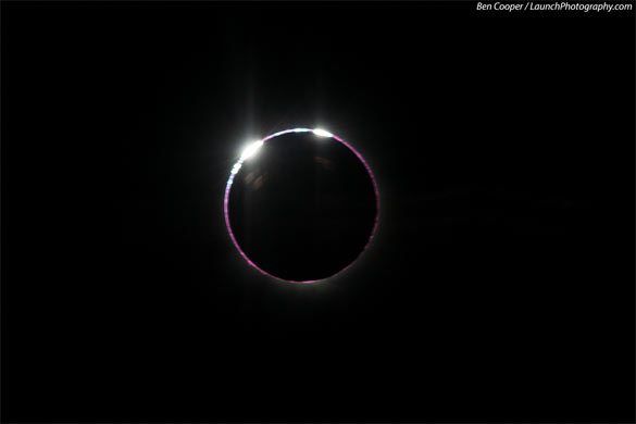 Cooper caught the last tiny bead of sunlight poking through, forming the "diamond ring."