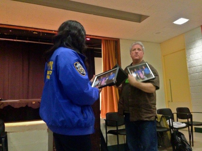 officer walker and nathan thompson at precinct meeting