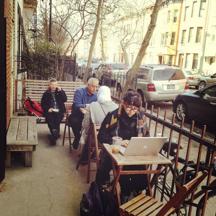 Working, drinking, snacking at Postmark. Photo by Park Slope Stoop.