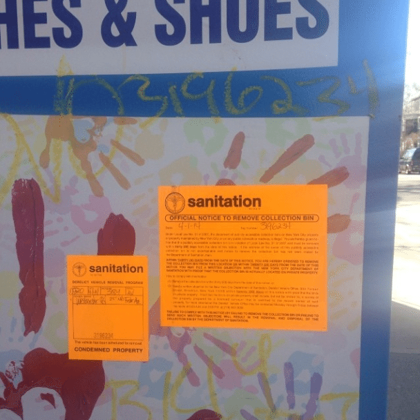 illgeal clothing donation bin sanitation stickers