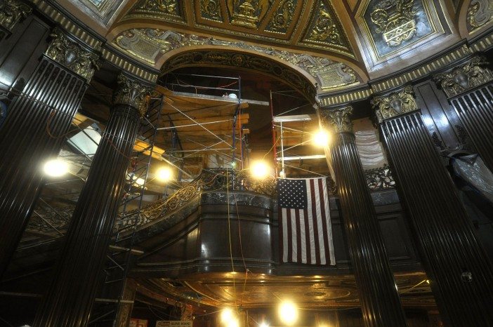 staircase and flag in lobby at Kings Theatre 