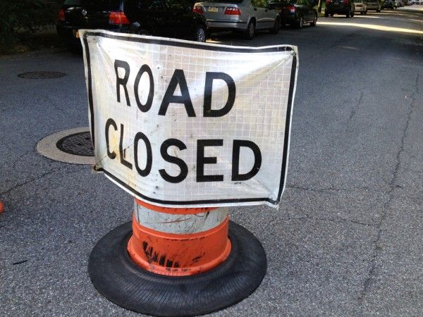 Photo of a sign telling drivers the road is closed