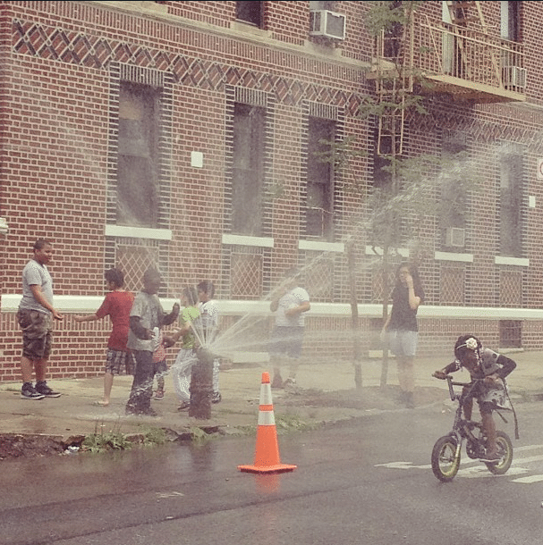 Children playing in fire hydrant sprinklers (Photo: Mary Bakija)