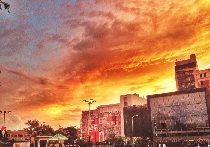 sunset over williamsburgh bank building by ocabreraphotos