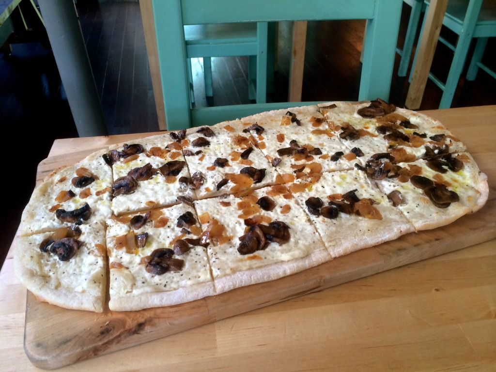 The flammkuchen is an ordered right for more than just one. (Courtesy Fort Greene Focus)