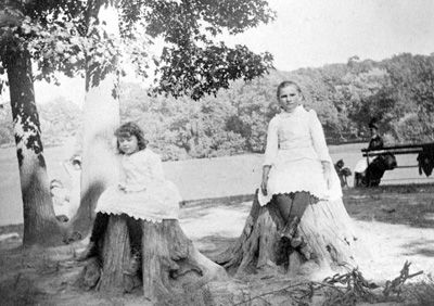 Prospect Park girls on tree stumps