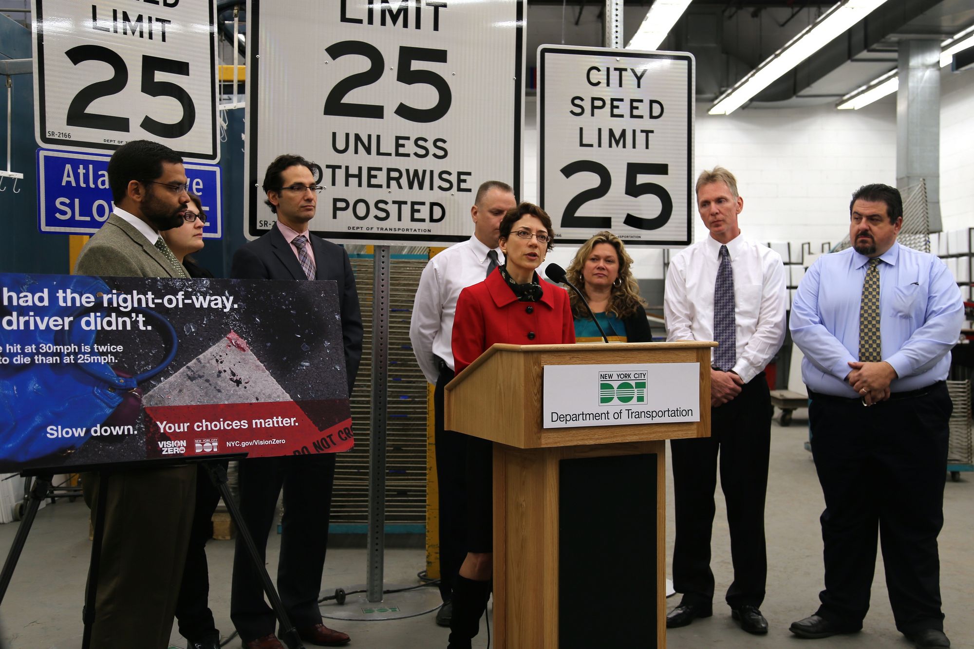 DOT Commissioner Polly Trottenberg unveils the city's new 25mph speed limit signs