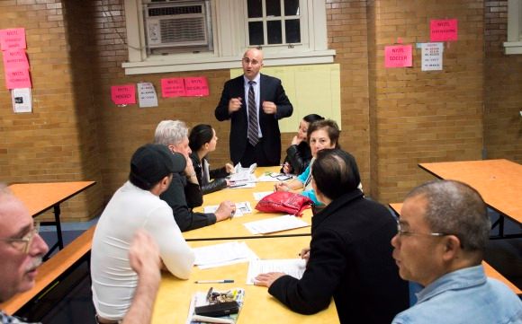 Igor Vaysberg, a staffer for CM Treyger, listens to ideas from community members at an October 20. Photo by Aliza Chasan