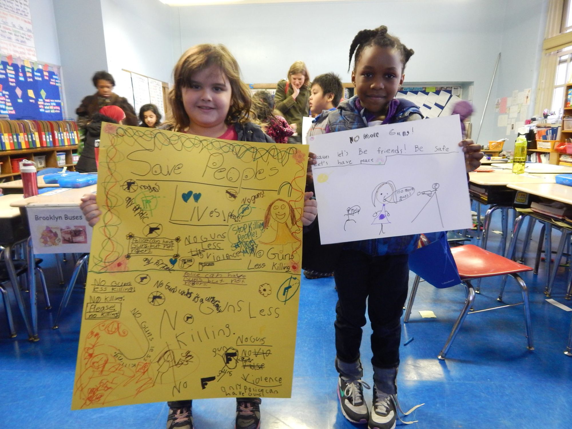 PS 139 students holding posters