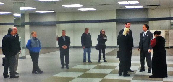 Councilman Deutsch led a tour of the vacant Loehmann's space, where the meeting was held.