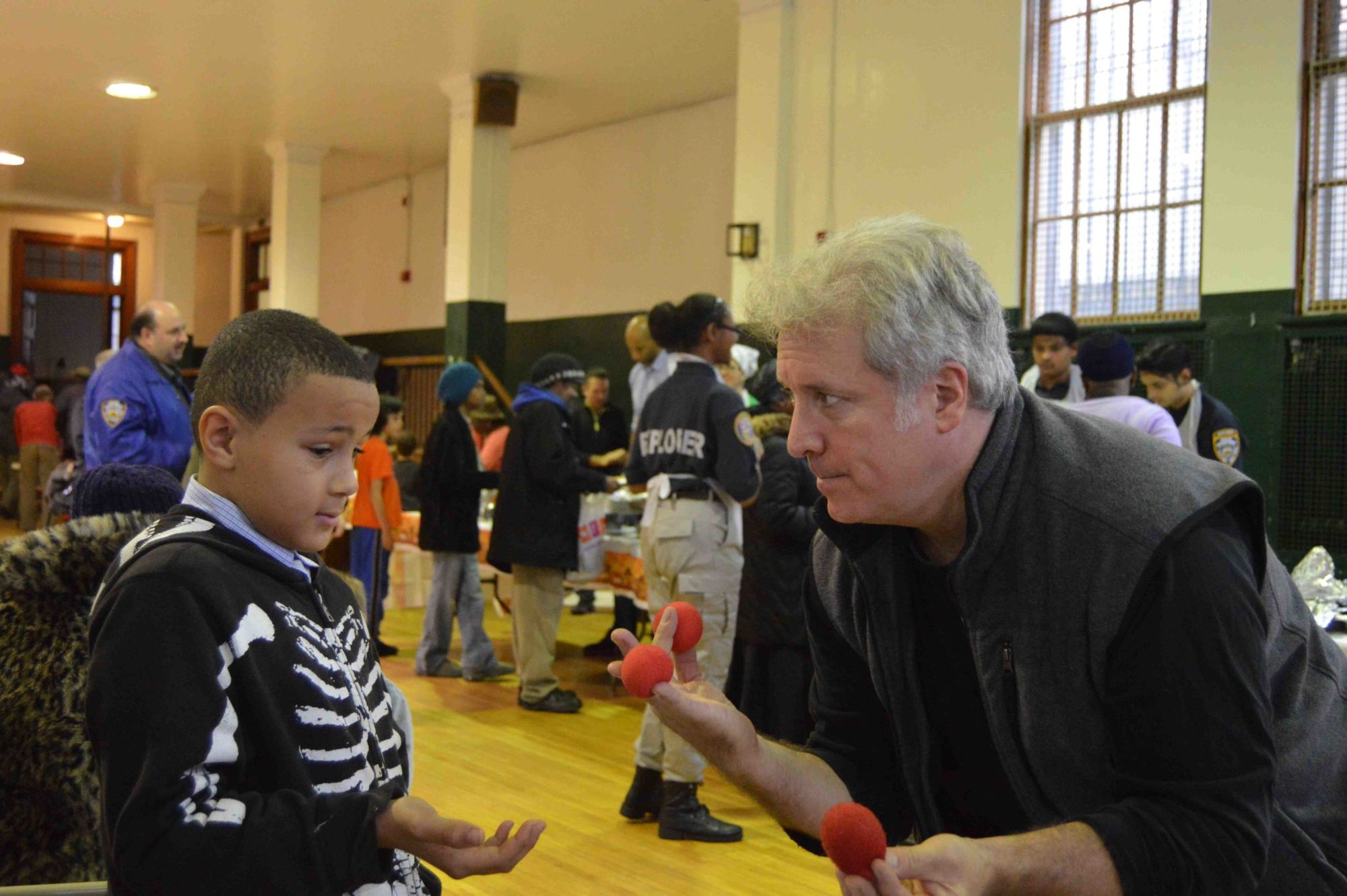 Magic tricks performed by local community leader and talented magician, Nathan Thompson, at the annual Thanksgiving lunch at the Flatbush Reformed Church.