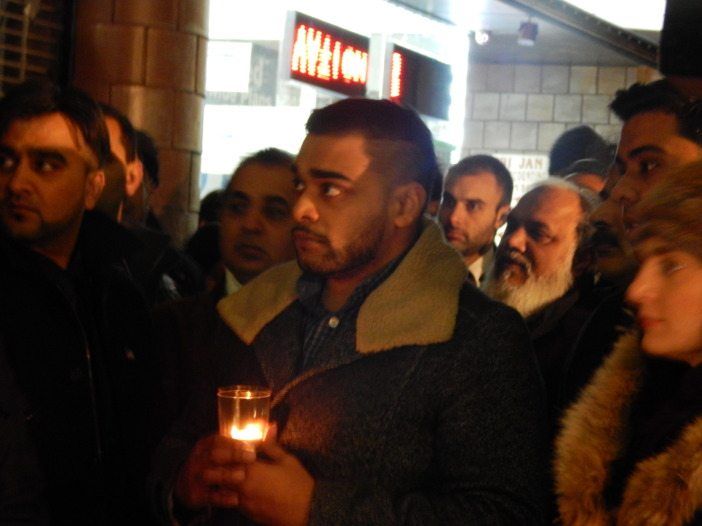 Peshawar vigil crowd with candle